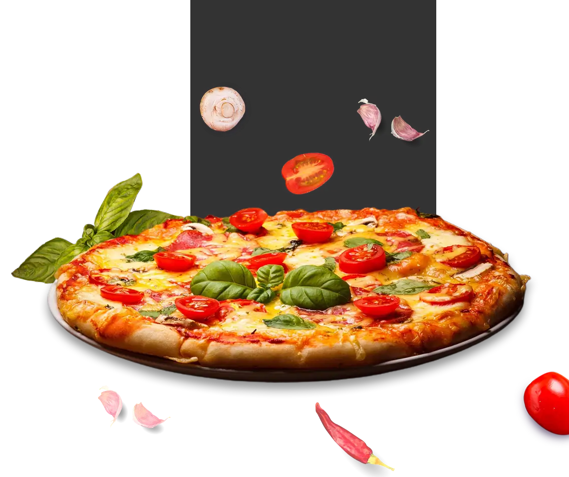 A pizza with tomatoes and basil on it.
